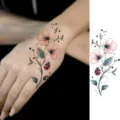 Autocollant de tatouage temporaire coccinelle et fleurs pour le dos de la main, imperméable art. - HS135