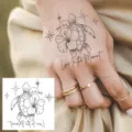 Waterproof temporary tattoo sticker featuring cute sea turtle and flower design for body art. - HA193 / 8x8cm