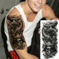 Waterproof temporary tattoo sticker featuring realistic dragon and samurai skull design for arm. - NZ187 / 19.8x9.6CM