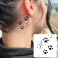Temporary tattoo sticker with cute paw prints and sparkles design, perfect for ear or hand use. - Paw Print & Starburst (HA192) / 8x8cm