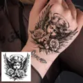 Temporary tattoo sticker featuring an angelic cherub and roses design for hand body art. - Angel & Rose (HA254) / 8x8cm