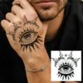 Temporary tattoo sticker for back of hand featuring vintage eye and lightning design body art. - Eye & Lightning Totem (HA257) / 8x8cm