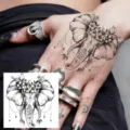 Hand back tattoo sticker featuring an elegant elephant with floral design for body art. - HA197