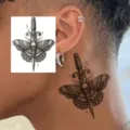 Gothic tattoo sticker featuring a skull moth and dagger design for edgy body art decoration. - HM152 (Dagger Skull Moth)