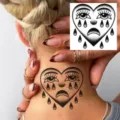 Temporary tattoo sticker featuring a classic crying heart design, perfect for neck or body art. - HA246
