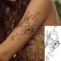 Water transfer tattoo sticker featuring a delicate hummingbird and floral vine design, perfect style. - Hummingbird Floral Style (FO261) / 15x7CM