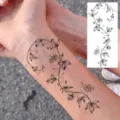 Temporary tattoo sticker featuring elegant floral vine design, perfect for arm or hand. - Vine Floral Style (FO446) / 15x7CM