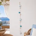 Mediterranean style photo wall hanging with shells and starfish for ocean theme home decor. - Shell and Two Starfish Photo Clip
