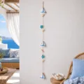 Mediterranean style photo hanging garland with blue sailboat and starfish for ocean theme room decor - Sailboat and Two Starfish Photo Clip