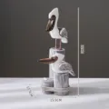 Statua decorativa da tavolo in legno con statuetta di uccello pellicano mediterraneo 32cm - 3 Pz Piccoli Uccelli Doppi Gialli Vintage su Tronco