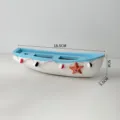 Decorazione da tavolo per barca in stile mediterraneo modello in resina con stella marina. - Piccola Nave / Azzurro