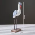 Wooden bird figurine rustic coastal home decor tabletop ornament statue with metal legs - Small Vintage Blue Seabird Ornament