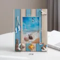 Mediterranean style wooden photo frame with ocean theme decorations, perfect for home decor. - 6-Inch Retro Blue Paddle Vertical