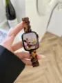 Detailaufnahme des Schildpatt Harz Armbands mit blütenförmigen Gliedern und glänzendem Finish. - Harz Oval - Amber Braun