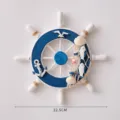 Mediterranean wooden ship wheel wall hanging detail view, nautical decoration craft ornament. - Blue Board White Bead Attached Fish Style