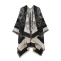 Close-up detail of women winter warm floral cape, black and white shawl with chic fringe edge. - Tops / Black