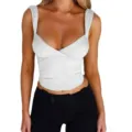 Detail view of the stylish white slim-fit camisole, featuring wide straps and a sexy low cross-neck design. - S / Tops / White