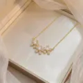 Elegante collar cadena clavícula flores perla circón para mujeres, joyería estilo europeo detalle. - Estilo X1304 / Dorado