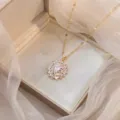 Elegante collar con colgante de flor de circonita dorada, cadena clavicular de moda para mujer. - Estilo Strass X1330 / Dorado