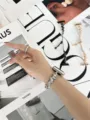 Metallkettenarmband für Apple Watch mit einzigartigem wellenförmigem Design, elegant stilvoll. - 38mm / Silber