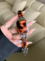 Vervangend horlogebandje van schildpadhars en metaal compatibel met Apple Watch. - Donkere Ridder / Schildpadmotief