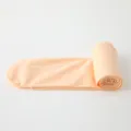 Detailed view of elastic children dance ballet tights rolled up soft fabric closeup photo - S / Bottoms / Nude