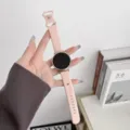 Pink silicone smartwatch replacement strap detail view, soft and comfortable daily wear. - Pink Sand