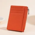 Tarjetero de cuero naranja con bolsillo con cremallera, estuche minimalista y monedero. - Naranja