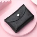 Monedero negro de cuero genuino, mini cartera compacta con boton de presion y textura suave elegante. - De una capa / Negro