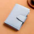 Mini blue trifold wallet for women, compact leather card holder with snap closure. - Light Blue