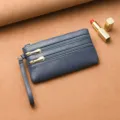 Bolso de mano largo de piel suave para mujer con lichi, variante de monedero multi cremallera. - Azul
