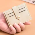 Slim PU leather card holder with multiple slots and metal snap closure for women. - Apricot