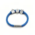 Men's blue braided leather bracelet with silver magnetic clasp and charms detail shot. - Blue Christmas Style