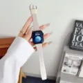 Vista dettagliata di un cinturino di ricambio minimalista ed elegante per smartwatch con fibbia. - 38mm/40mm/41mm / Grigio Rosa Chiaro