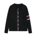 Women's black knit cardigan featuring a round neckline, pearl buttons, and stylish red white stripes. - S / Black