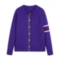 Close-up detail of purple knit cardigan featuring gold tone buttons and striped sleeve trim. - S / Purple
