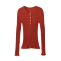 Ribbed knit fabric detail showing fine vertical texture and neat button placket on long sleeve top. - S / Tops / Red