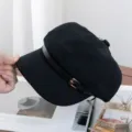 Black retro newsboy cap for women with leather strap and metal buckle, stylish British beret. - Adjustable / Black