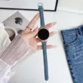 Denim smartwatch strap detail view with rose gold connectors and stylish classic design. - Vintage Blue