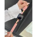 Pink leather watch strap compatible with Apple Watch featuring gold star and moon charms. - Rose Gold with Pink Leather