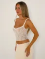 Detail view of women sexy lace camisole tank top, elegant ruffle strap design, soft fabric. - S / Tops / White A