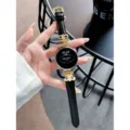 Luxury black leather smartwatch strap with gold metal decor, stylish replacement band. - Compatible with Huawei GT1 (Sport / Fashion / Active Edition) - 22mm / Black