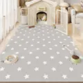 Grey star PVC pet mat detail showing waterproof non-slip surface in home setting with fence - 40x60cm / Star Wish Cabin