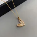 Vergoldete Halskette mit Zirkon-Herzanhänger für Damen, filigraner Zirkonia Schmuck. - Gold