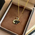 Elegante goldene Titanstahl Halskette mit funkelndem schwarzen Schwan Anhänger für Damen. - Goldschwarz
