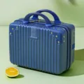 Mini 14 inch blue cosmetic travel suitcase with vertical stripes and top handles. - Sapphire Blue