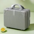 Mini 14-inch hardshell cosmetic case portable travel makeup storage box with password lock. - Silver Gray