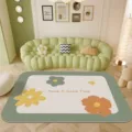 Modern waterproof PVC living room rug with floral pattern, easy clean floor mat for sofa. - Puzzle Floral Orange