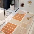 Wabi-sabi style bathroom loofah mat, hollow non-slip floor rug for shower room and home use. - Orange Morning Dew