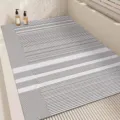 Modern anti-slip bathroom mat, black and white striped PVC floor runner for shower room use - 45x70cm / Line-following Daydream
